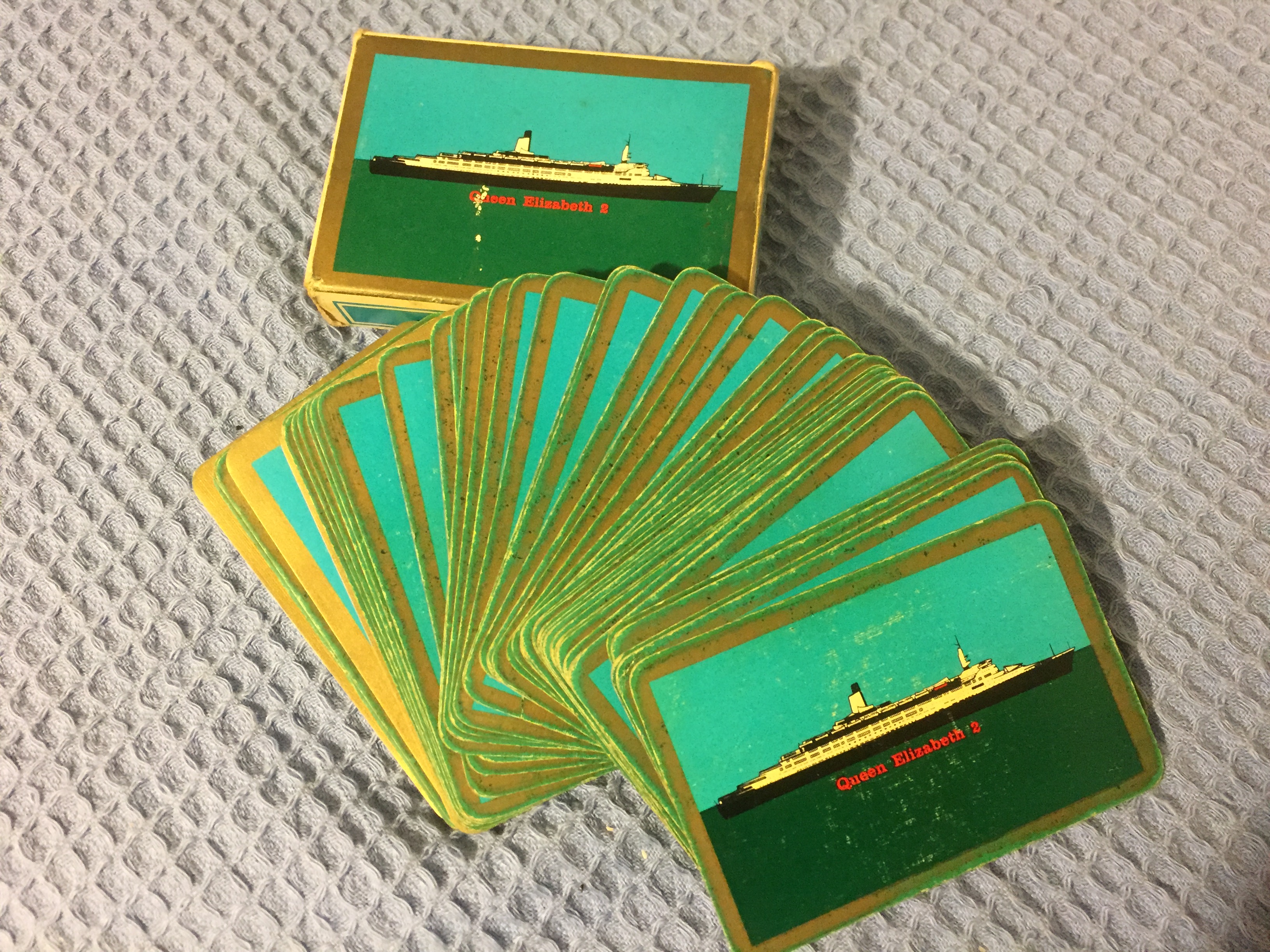 SET OF PLAYING CARDS FROM THE VESSEL THE QE2