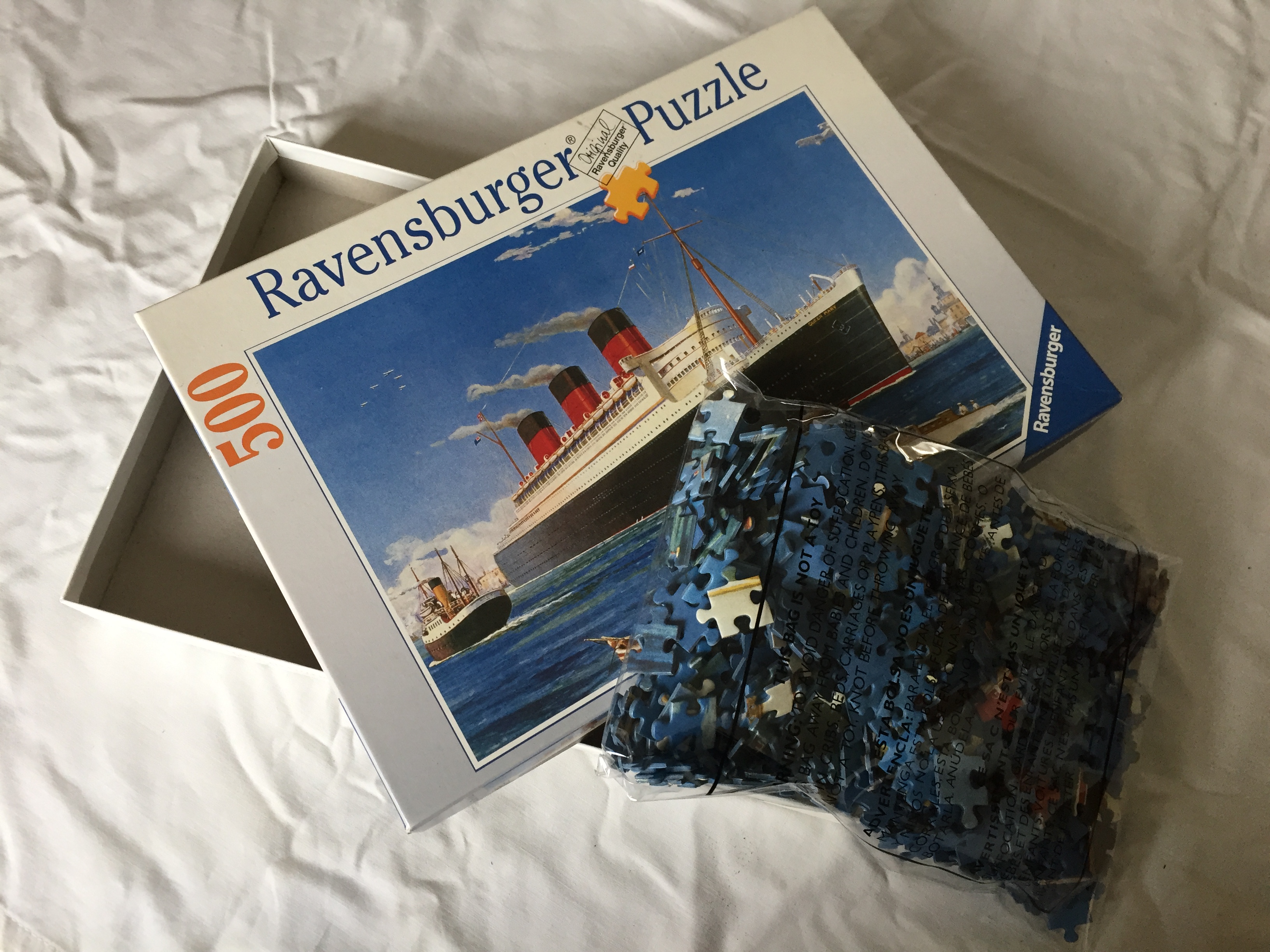 JIGSAW PUZZLE OF A VESSEL AT SEA FROM THE FAMOUS RAVENSBURGER PUZZLE COMPANY